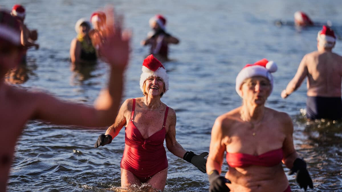 Traditional Christmas Day swim attracted many Europeans