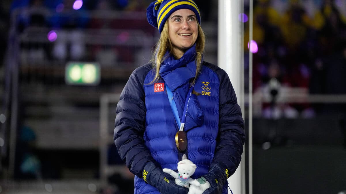 Ebba Andersson receives her Olympic gold medal at closing ceremony in Verona