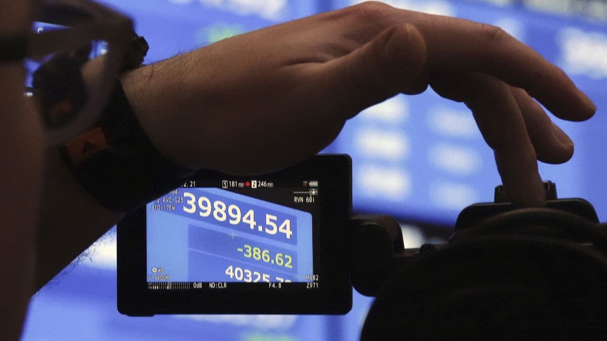 Up in Asia as Japan raises interest rates