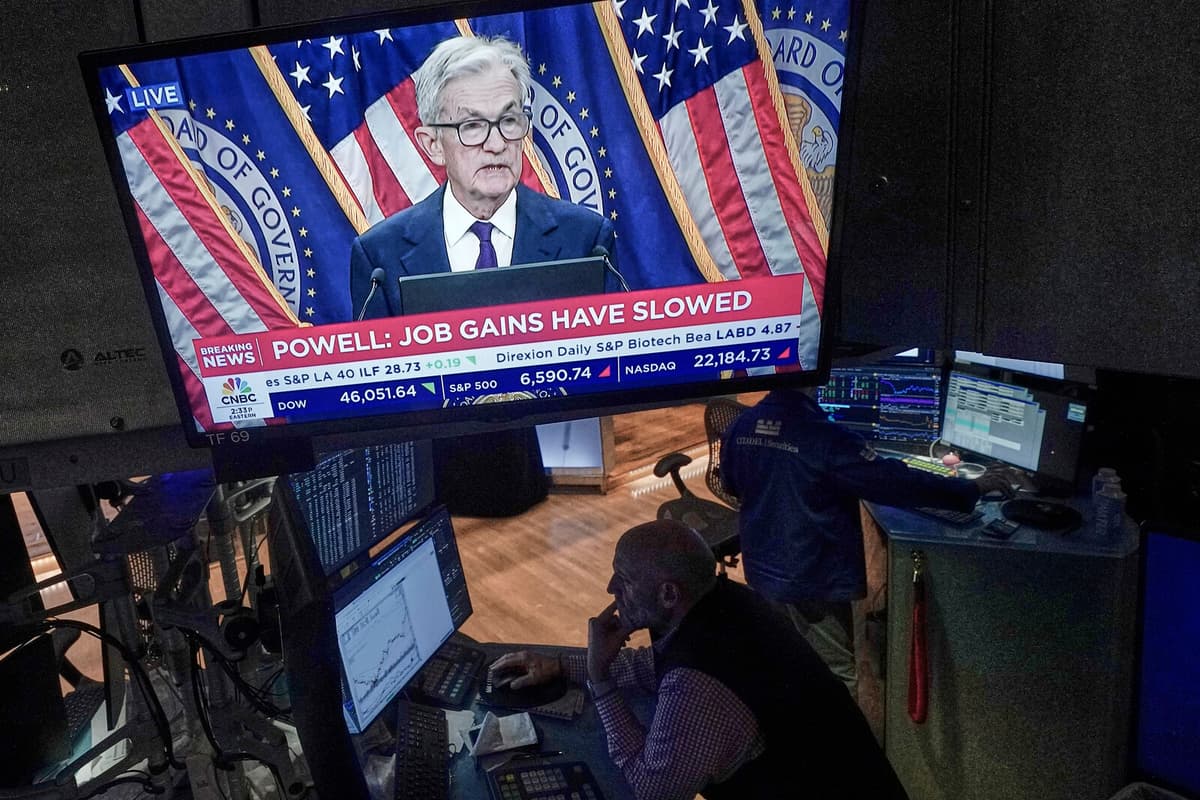 Wall Street Mixed as Fed Cuts Interest Rate but Signals Caution