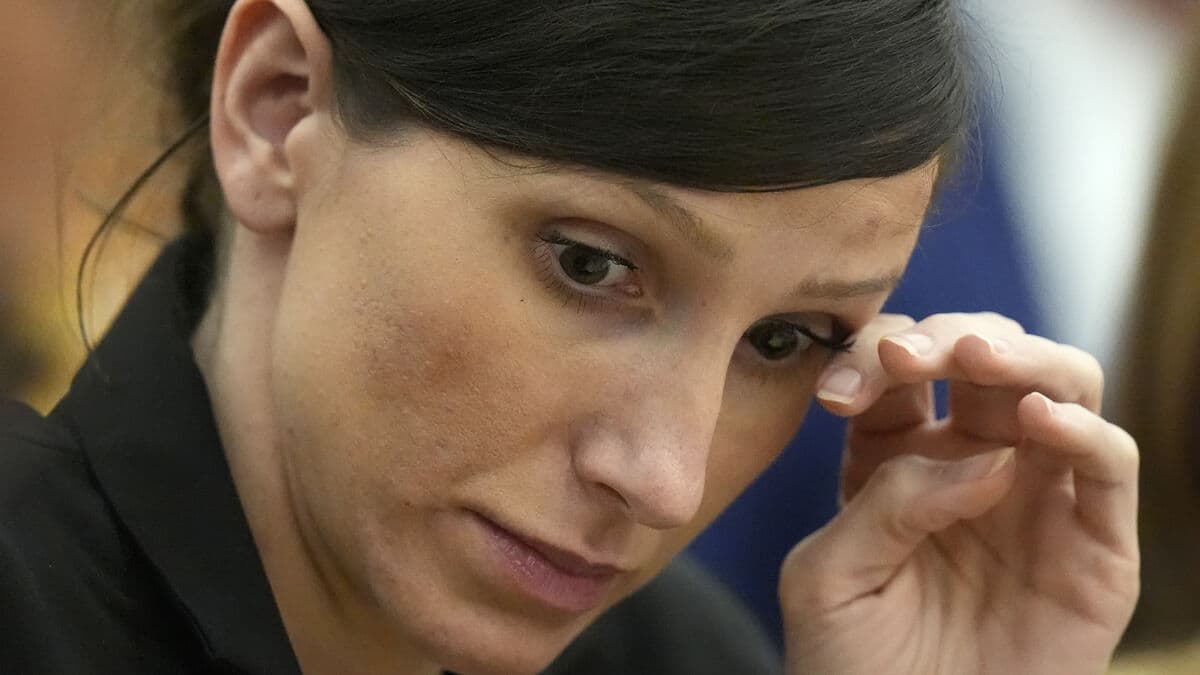 Wrote a book about her husband's death - charged with murder