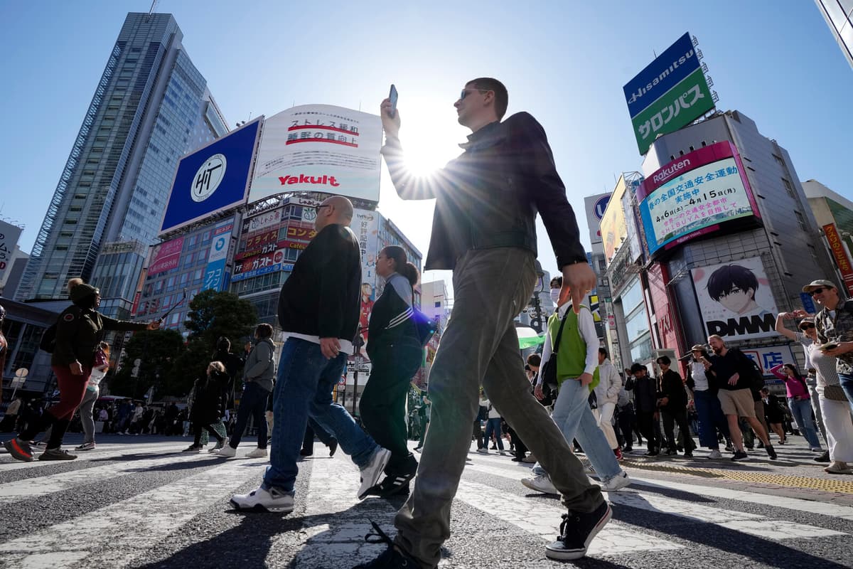 Tokyo and Hong Kong Stocks Rebound After Monday's Decline