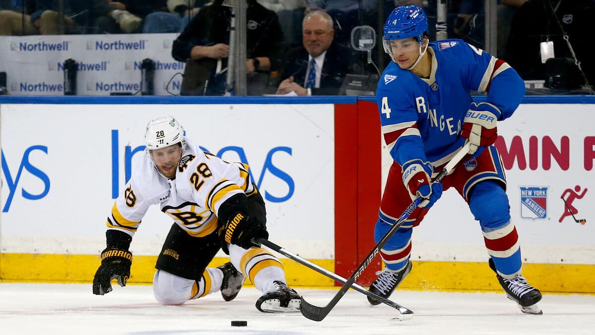 Elias Lindholm scores two goals but Boston loses to Rangers in overtime